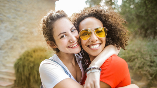 two people smiling